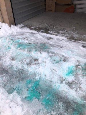 12 inch mound solid ice covered in snow.This is after 30 min of throwing salt and digging at it with the plastic shovel from property mngr