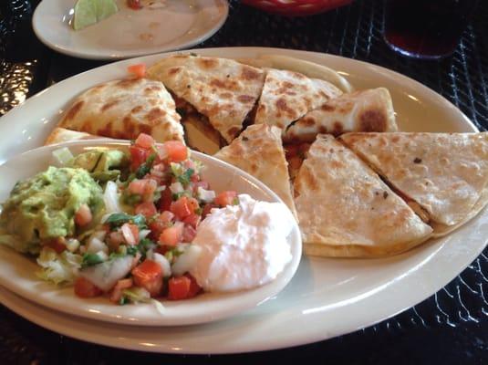 Mixed chicken and beef quesadillas