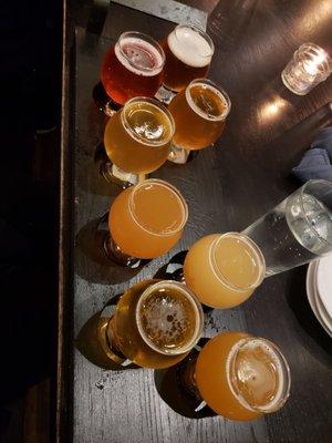 Great flight.  My friend took all the ipas, I enjoyed the sours, wheats and saisons.    The poutine was quite hefty.   The Buffalo cauli meh