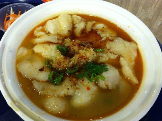 Poached sliced Fish in chili broth