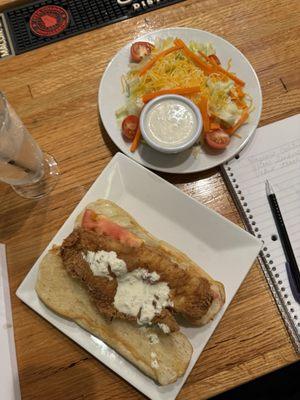 Fish sandwich and salad