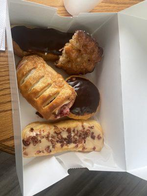 the donuts I bought.  Yes, that's a maple bacon long John!