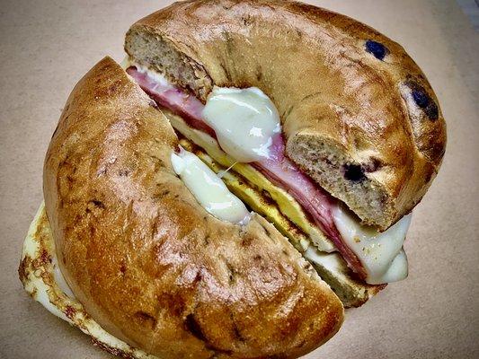 Blue Sky Breakfast Bagel
- Ham, eggs, cream cheese and Swiss cheese on a blueberry bagel!