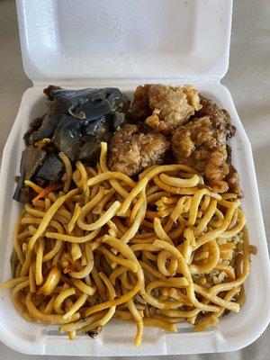 Eggplant with fried tofu, orange chicken, chow mein, and fried rice.