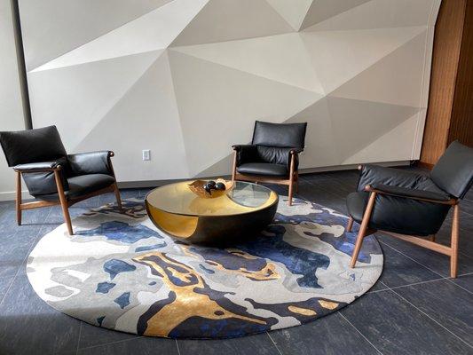 A custom round rug, designed for an architect firm.