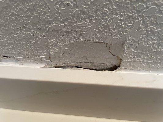 hole in wall because splashbacks were not measured correctly