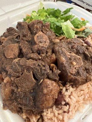 Oxtail and Rice and Peas! Delicious and generous portions! Big Fan