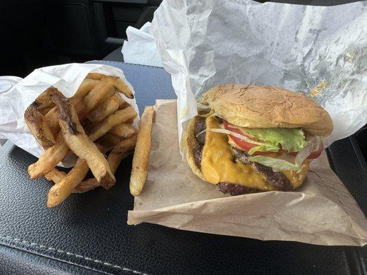 Atomic burger with Sriracha mayo, fries and spicy ketchup.