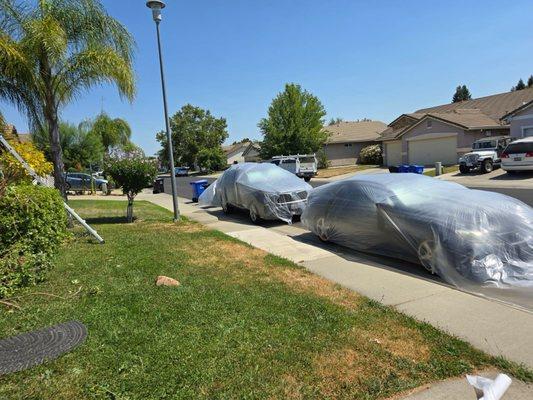 Cover ours and neighbor's car in case the wind blow the paint over.