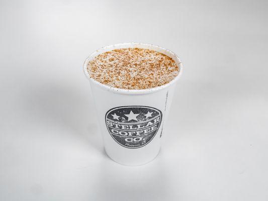 Maya Chai Tea Latte Topped with Cinnamon Powder.