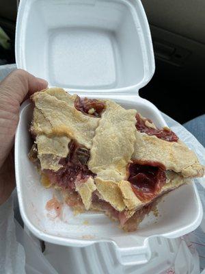 Strawberry rhubarb pie, partially in my belly.