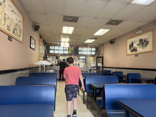 Inside looking towards the counter behind the plastic wall