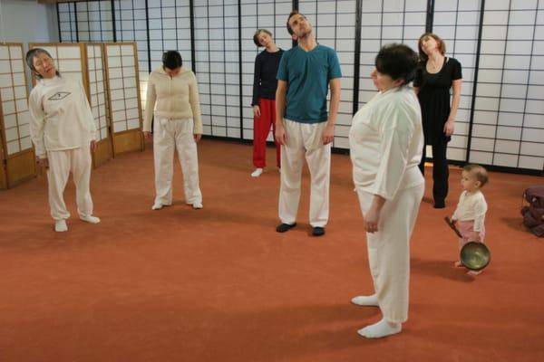 The standing meditation, a grounding practice, begins the Makaho meridian exercise sequence.