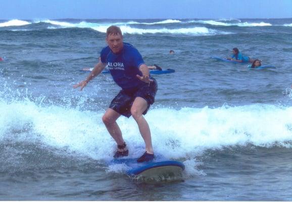 Catching a Wave at Poipu Beach in Kauai, HI.