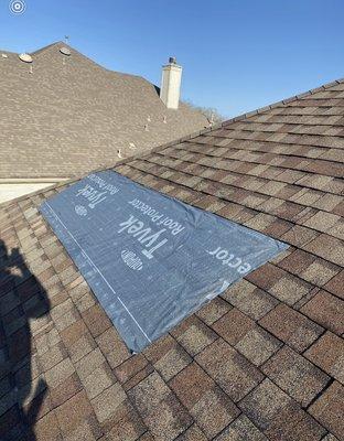 Tarp protection until Insurance adjuster can inspect roof claim