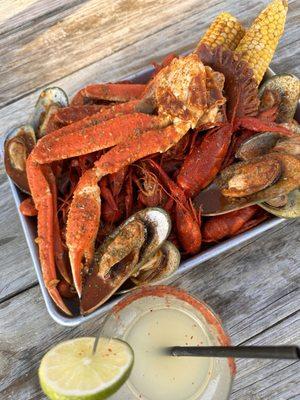 Snow crab legs, crawfish, mussels, corn, sausage - with hot butter