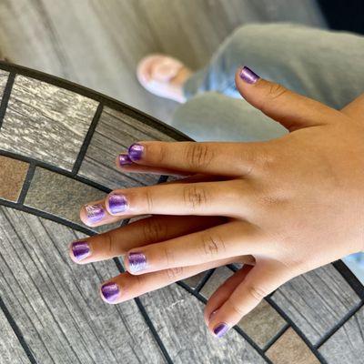 Mommy Daughter day today! She got a mani/pedi with a cute flower design! We love this place - highly recommend!