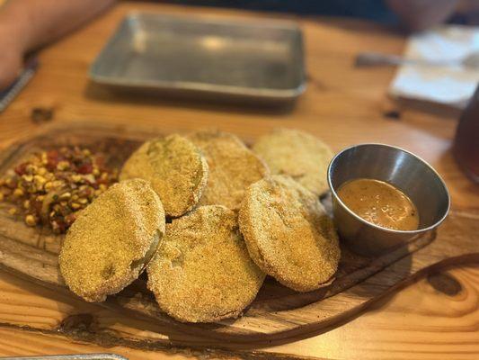 Fried green tomatoes with corn relish and delicious vinaigrette