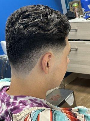 1940's Inspired combover with a  skin taper