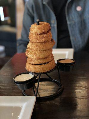 Towering Onion Rings 6 or 13. Comes with a Tangy BBQ Ranch type sauce & Ranch.