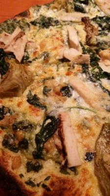 Spinach and artichokes pizza