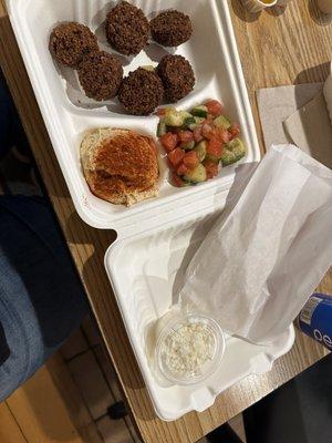 Genie 's Plate; Falafel, hummus Mediterranean salad, pita