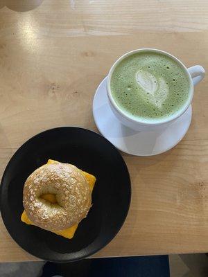 Vegan egg & cheese sandwich on a jalapeño salt bagel and a 16 oz matcha latte with oatmilk and hazelnut syrup