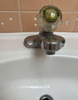 Before Meir arrived. Faucet that wouldn't stop leaking, and very dirty!