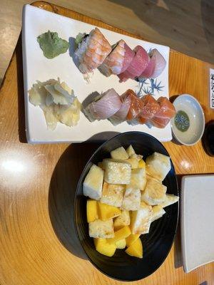 Rainbow roll and fruit salad.