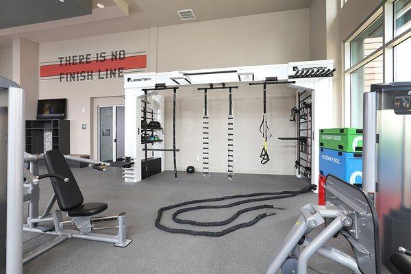 Spacious 24-hour fitness center and outdoor athletic terrace