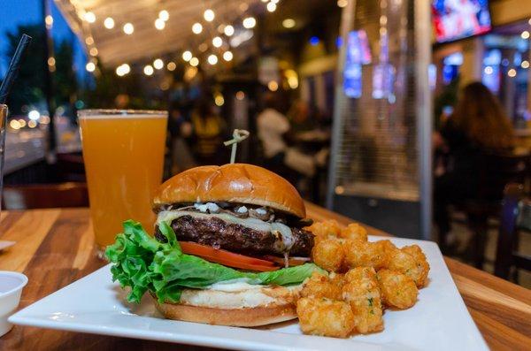 The Patio mushroom cheeseburger and garlic tots $16