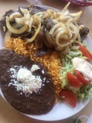 Beans, rice, steak, salad