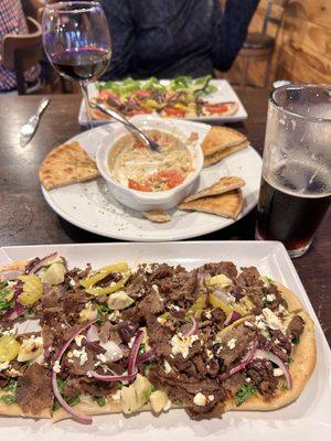 Eggplant hummus, Mediterranean flatbread with steak, gyro flatbread and of course the butter cake!