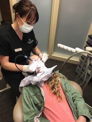 One of our awesome hygienists giving our patients first class service. Thx to our awesome team members who make City Creek Dental great.