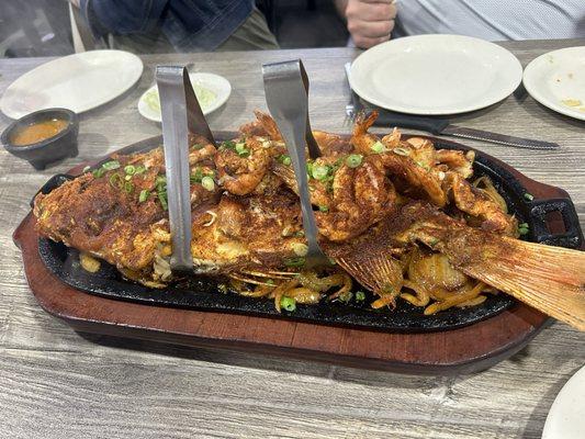 Sizzling red snapper with shrimp