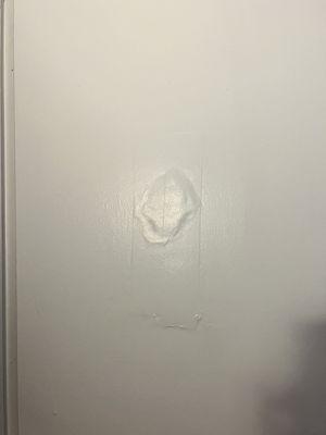 hole punched in our bedroom door