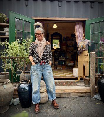 One of our Artisans with her Leather Shop