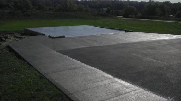 nice concrete apron and walk way in front of new garage we were building.