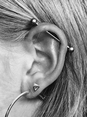 Fresh industrial piercing. Body piercing done daily on a walk in basis.