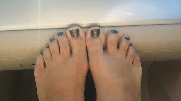 Loving my sparkling black pedicure