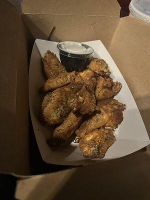 Lemon peppered wings delivered to your movie seat