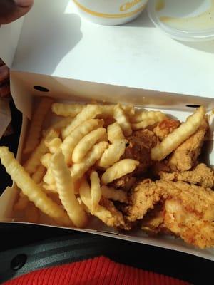 Chicken strips & fries with brown gravy and a sweet tea.  It gets no better than this.