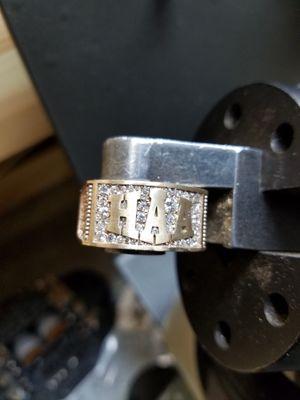 Custom men's gold + diamond ring being worked on in the shop!