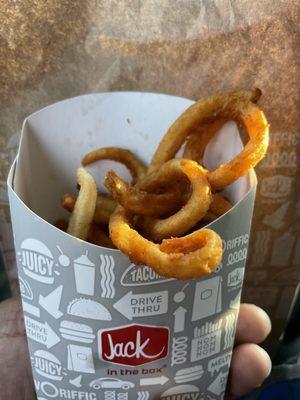 Half of these Medium Seasoned Curly Fries were old and hard!