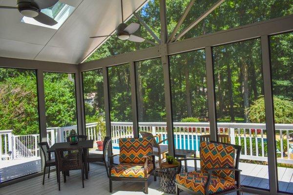 A beautiful view through this newly rescreened porch that Breeze Thru Screens completed with SCREENEZE and Tuff No See Um screen mesh.