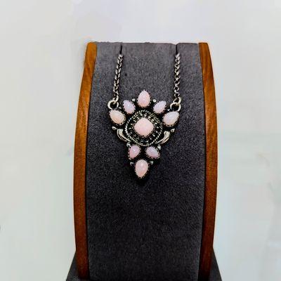 Pink opal necklace set in sterling silver.