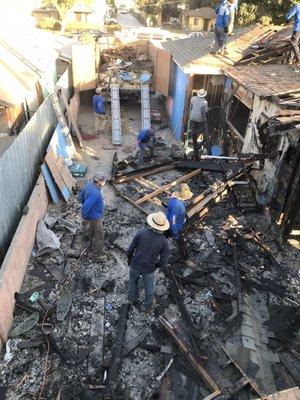 Demolition of a burned house in Compton California