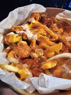 Loaded Buffalo fries hint of spice  crispy fries and delicious chicken