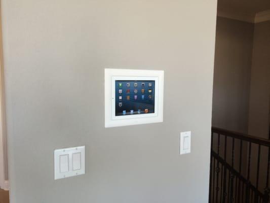 In-wall Ipad in model home for whole home audio control