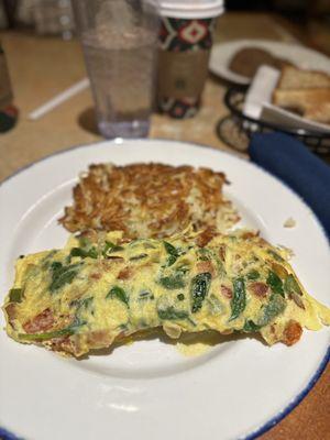 The vegetarian omelette with no mushrooms JAM PACKED WITH VEGGIES